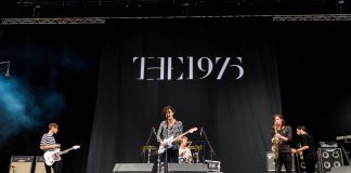 The 1975 play on a stage