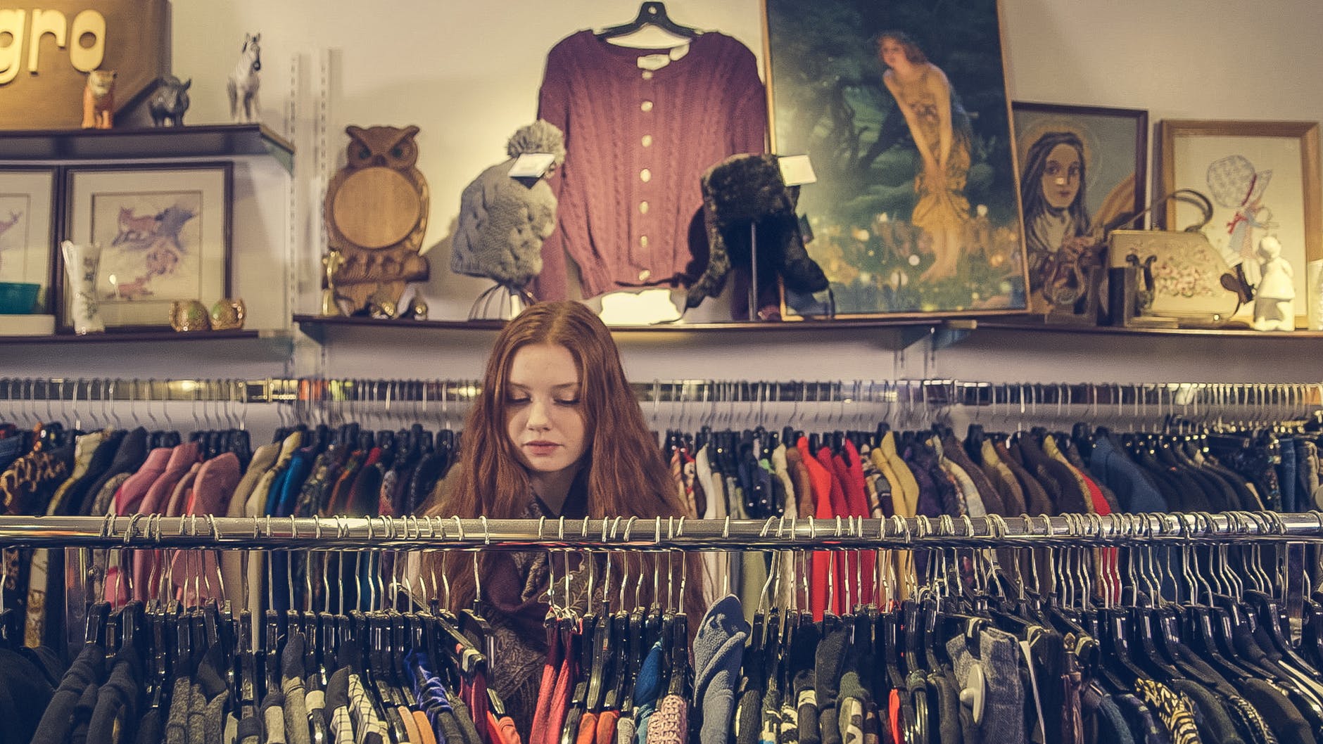 woman in vintage clothes shop