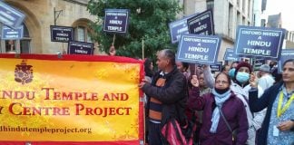 Protestors from the Oxford Hindu Community protesting with signs and banners demanding a Hindu Temple and Community Centre.