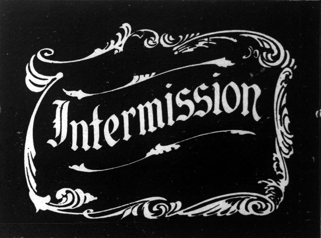 Old-fashioned intermission sign